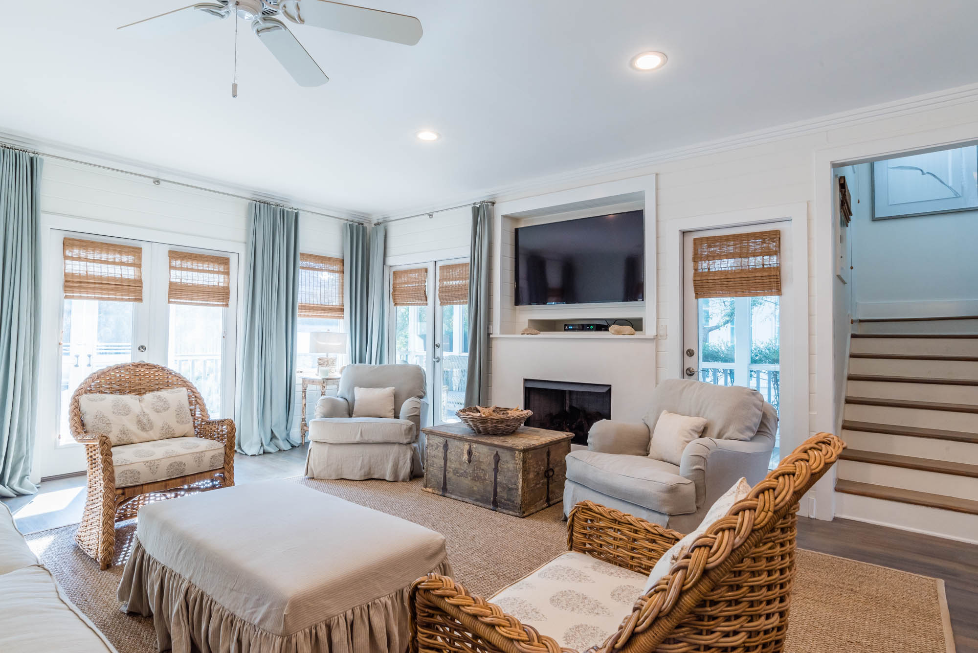 living room and a tv in our 30A Rentals